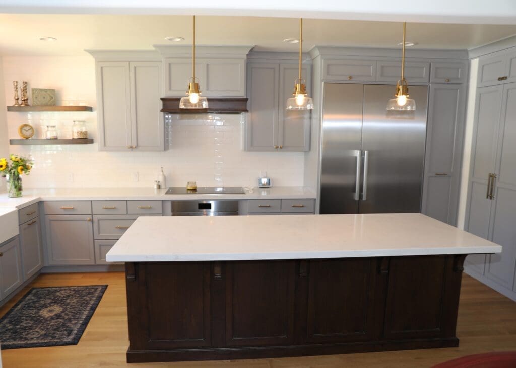Renovated Willow Glen kitchen with large center island, custom cabinets, and modern pendant lighting.